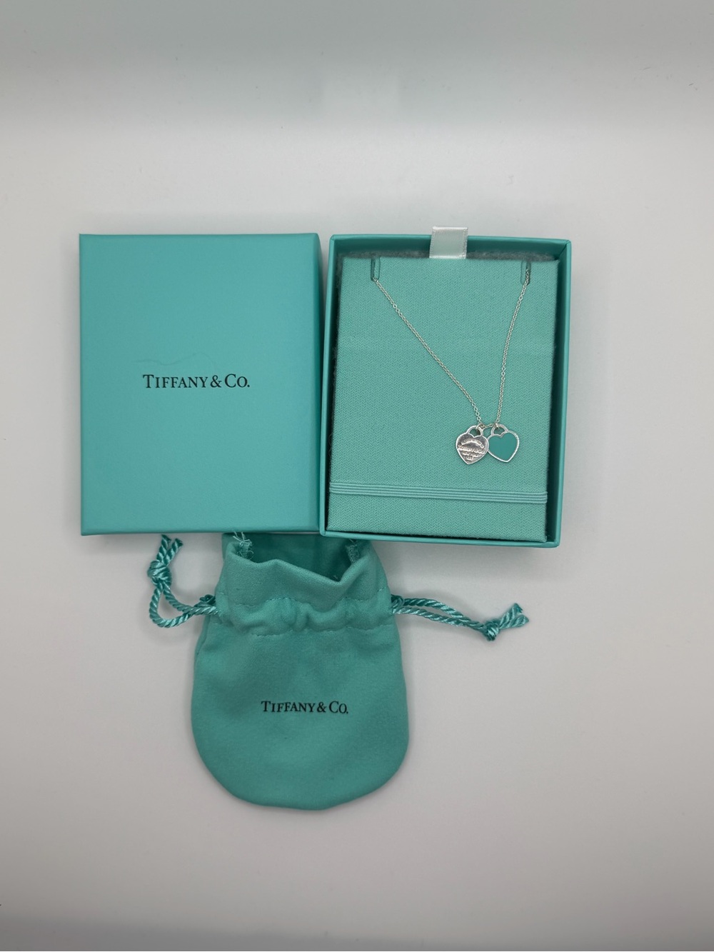 Tiffany & Co. Silver Interlocking Heart Pendant Necklace — Tiffany Blue